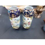 A pair of Nipon china hand painted vases (one chipped)