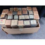 A collection of 26 pianola piano rolls