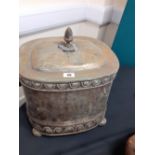 An Edwardian hammered brass and tin coal box