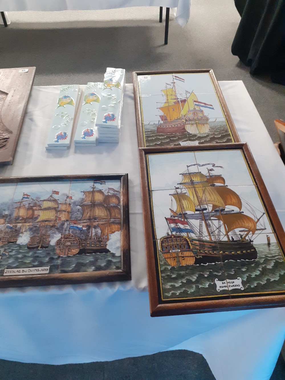 Three framed tile pictures depicting sailing galleons