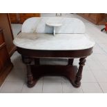 A mid Victorian mahogany and marble topped washstand 42"x22"x37"h