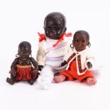 3 schwarze Puppen