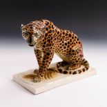Sitzender Leopard