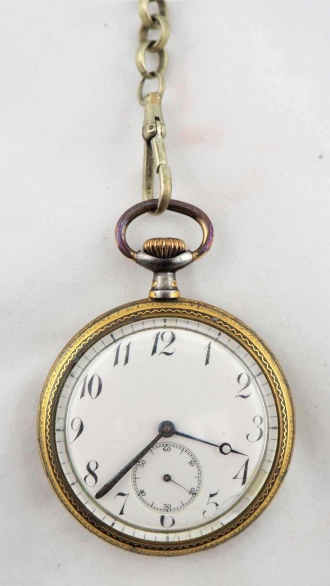 Herrentaschenuhr "Omega"um 1920, Gehäuse Metall, sehr aufwändig graviert und vergoldet.