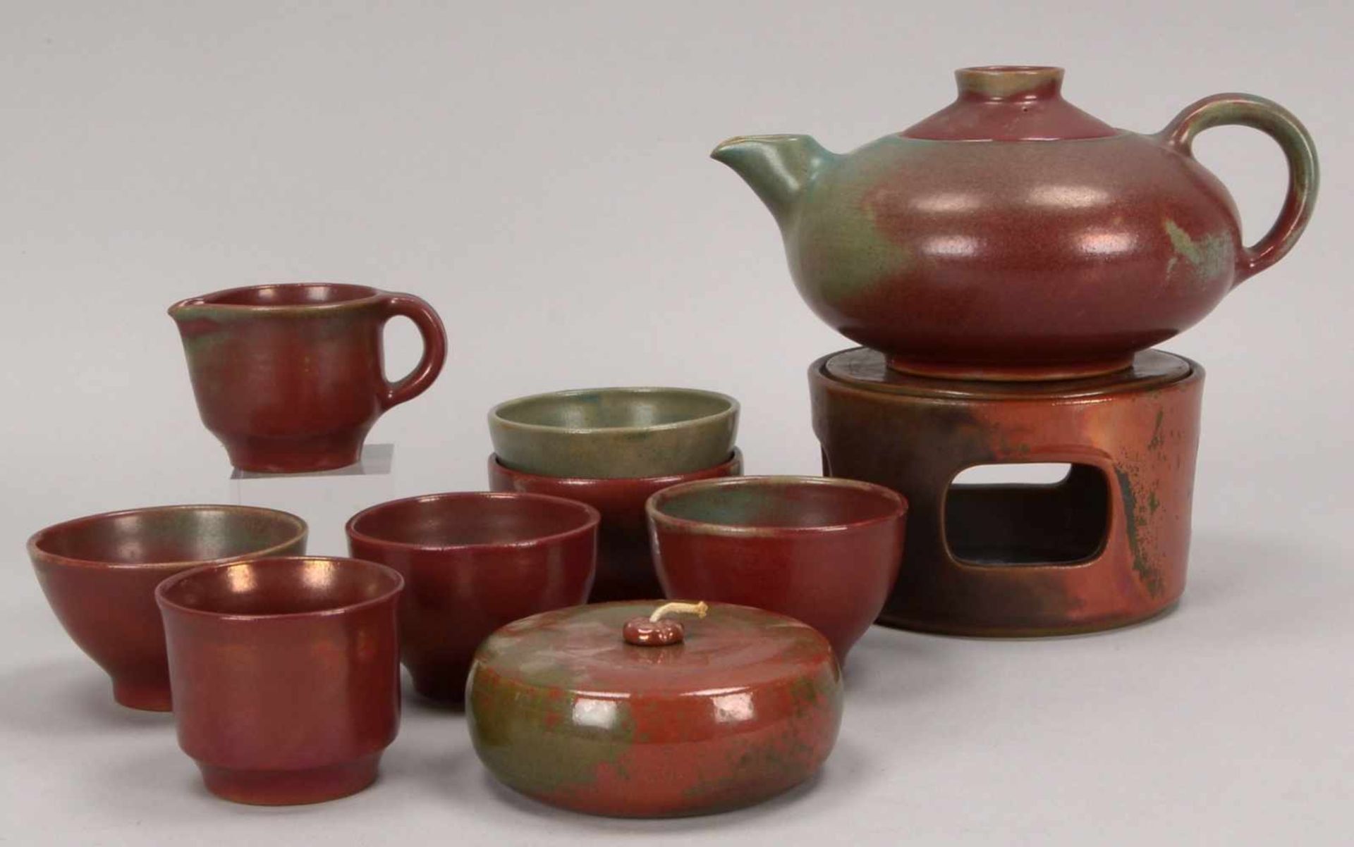 Wefels, Emmy, Künstler-Keramik, Teeservice, mit Ritzsignatur, umfassend: Teekanne auf Stövchen mit
