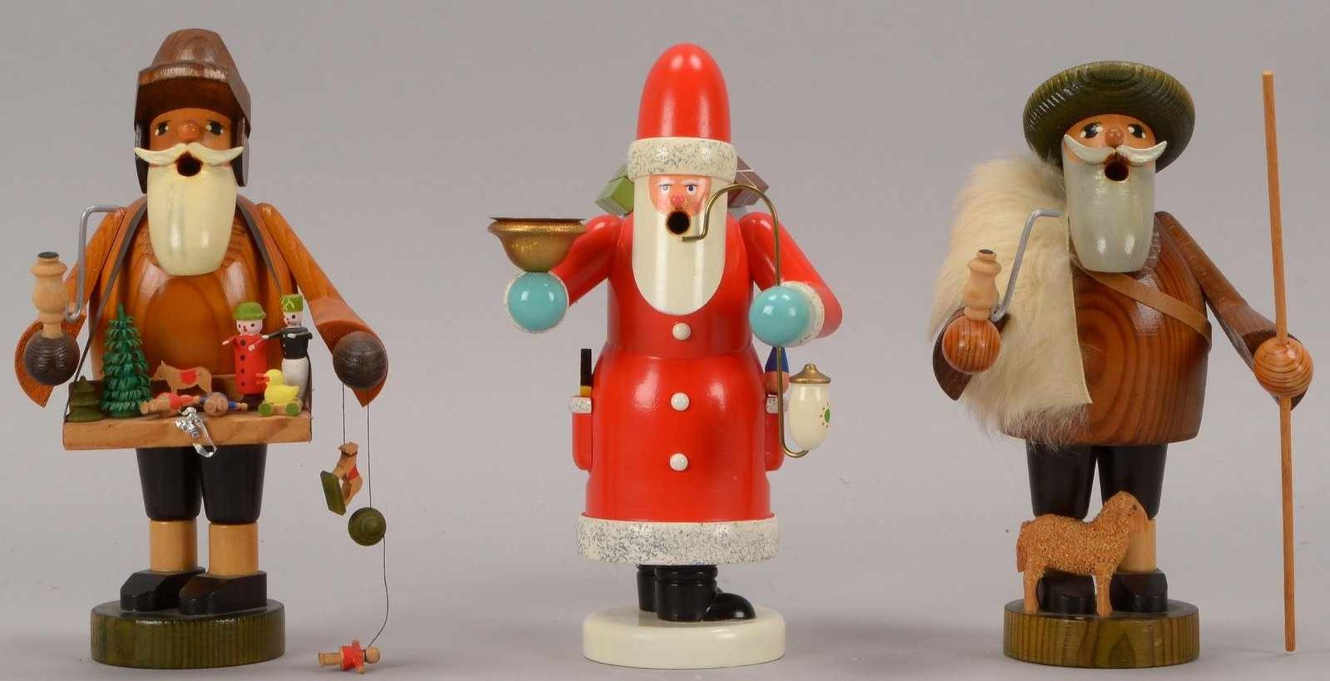 Erzgebirge, 3 Räucherfiguren, Holz, unterschiedliche Ausführungen: 1x 'Weihnachtsmann', 1x '