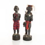 2 SOUTH AMERICAN TRIBAL WOOD CARVINGS OF MAN AND WOMAN.