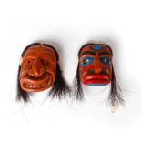 PAIR OF RESIN TRIBAL MASKS