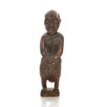 AFRICAN WOODEN SCULPTURE OF TRIBAL DRUM PLAYER