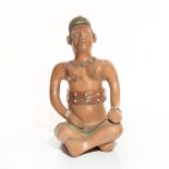 SOUTH AMERICAN CERAMIC FIGURE OF WOMAN SITTING