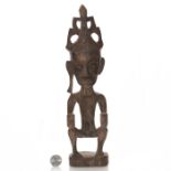 TRIBAL AFRICAN WOODEN SCULPTURE OF NUDE MAN.