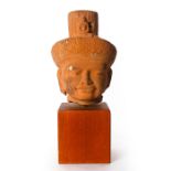 11TH C. KHMER HEAD OF VISHNU ON WOODEN BASE