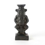 BLACK RESIN TRIBAL FIGURINE WITH HIEROGLYPHICS