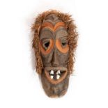 AFRICAN MASK, CARVED WOOD W. ANIMAL TEETH