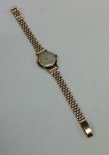 A lady's 9 carat wristwatch. Approx. 20 grams. Est