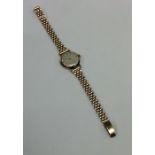 A lady's 9 carat wristwatch. Approx. 20 grams. Est