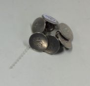 A good set of six Georgian silver circular buttons