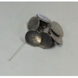 A good set of six Georgian silver circular buttons