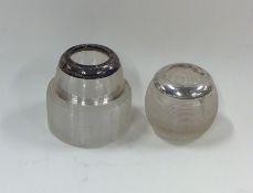 Two silver match strikers of textured form. Approx