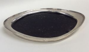 An Edwardian silver and ebony letter tray. London.