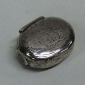 An Antique silver bright cut squeeze sided snuff b