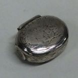 An Antique silver bright cut squeeze sided snuff b