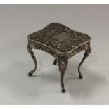 A novelty miniature silver table decorated with bi