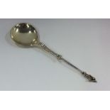 A silver gilt anointing spoon with tapering handle