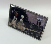 A rectangular butterfly wing picture in silver fra