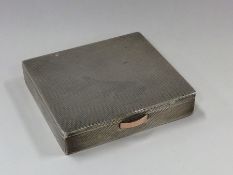 A good quality engine turned silver hinged top box
