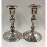A good pair of silver candlesticks with removable