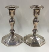 A good pair of silver candlesticks with removable