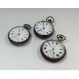 Two silver pocket watches together with a gilt exa