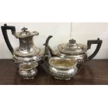 A heavy silver four piece silver tea set. Sheffiel