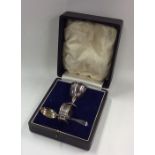 A cased silver three piece christening set. Approx