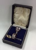 A cased silver three piece christening set. Approx