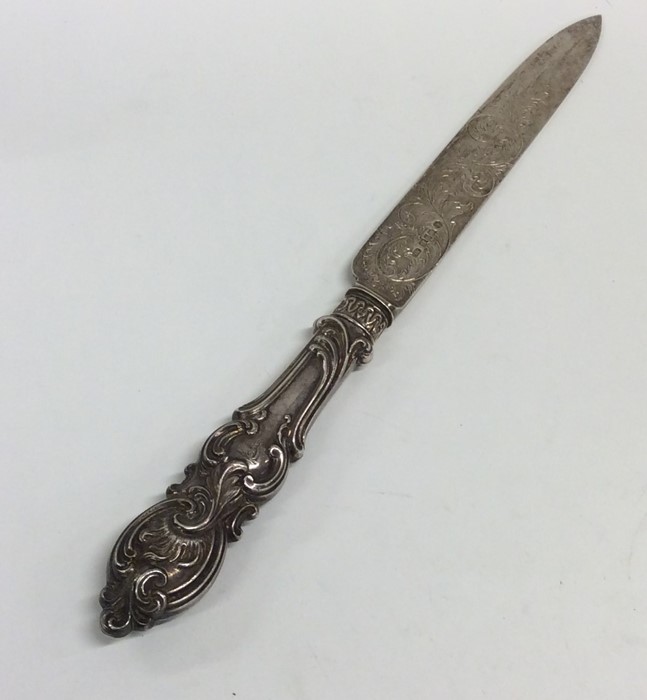 A Victorian engraved silver knife decorated with f