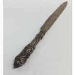 A Victorian engraved silver knife decorated with f