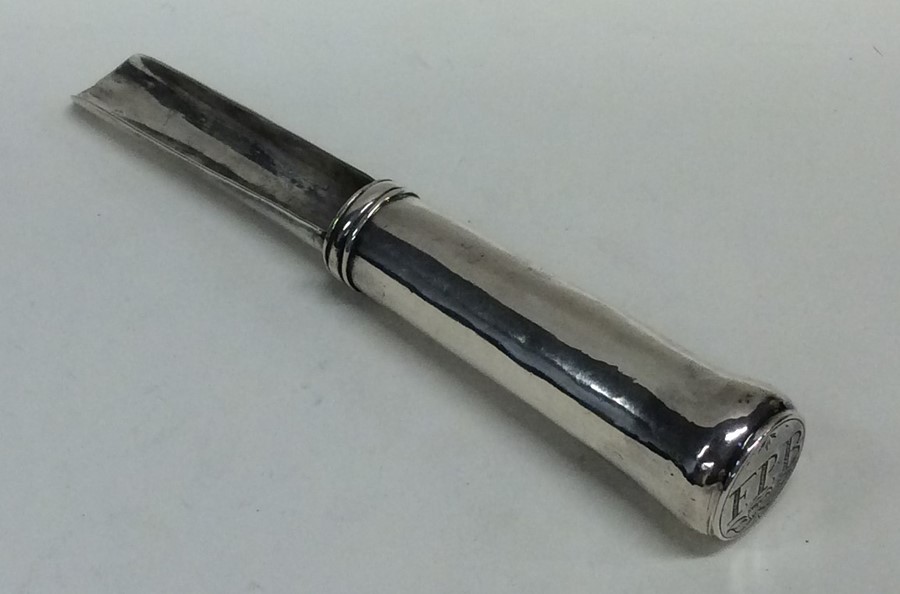 A rare 17th Century silver apple corer of tapering