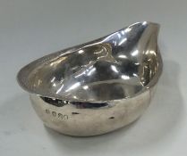 A Georgian silver toddy ladle with bright cut deco