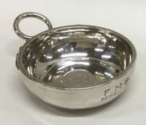 A French 19th Century silver wine taster with snak