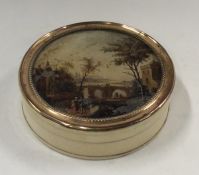 An attractive Antique ivory and gold mounted powde