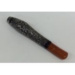 A Continental amber mounted cigarette holder with