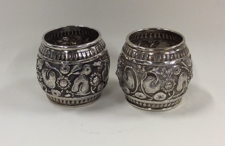 A pair of Indian silver napkin rings decorated wit - Image 2 of 2