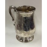 EXETER: A Victorian silver mug decorated with flow