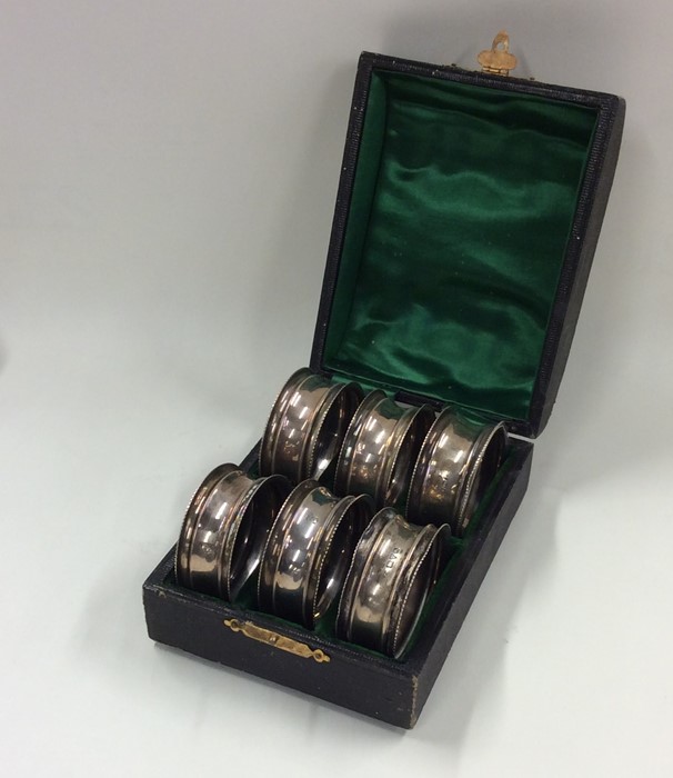 A cased set of six silver napkin rings. Chester. A - Image 2 of 2