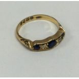 A sapphire and diamond five stone half hoop ring s