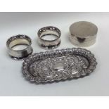 A pair of silver napkin rings, pin dish etc. Appro