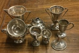 A collection of old silver trophy cups. Approx. 35