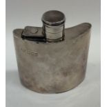 A small silver hip flask with hinged top. London.